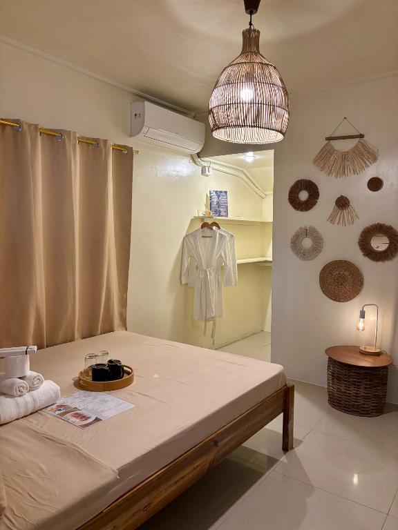 Postel nebo postele na pokoji v ubytování Bundal Riverside