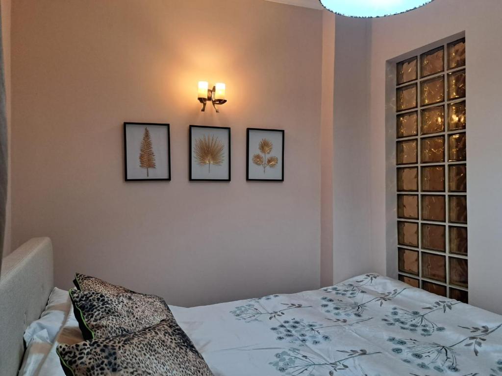 Postel nebo postele na pokoji v ubytování Center House