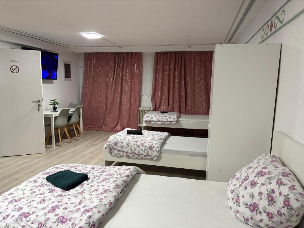 Voodi või voodid majutusasutuse Monteurzimmer, Monteurunterkunft in 20 km von Hanau und 35 km von Frankfurt am main toas