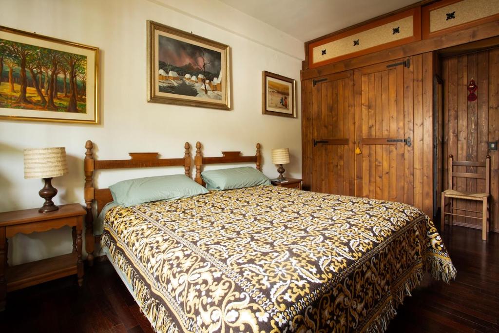 Postel nebo postele na pokoji v ubytování - 5 min Impianti da Sci - Appartamento in Residence