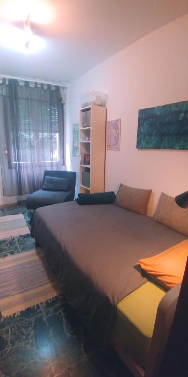 Postel nebo postele na pokoji v ubytování Ampi spazi, a piedi in centro.