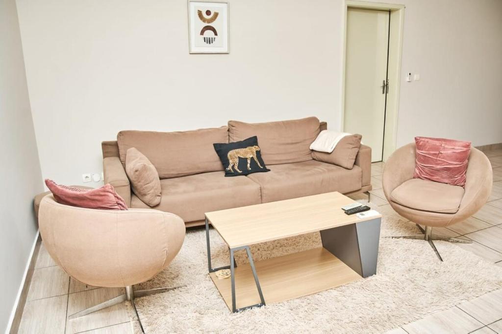 Istumisnurk majutusasutuses Le 4ème Ciel Appart Cosy et Équipé Wifi 2TV