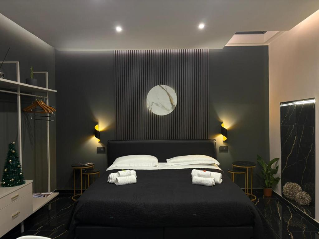 Giường trong phòng chung tại Elite holiday apartments Catanzaro