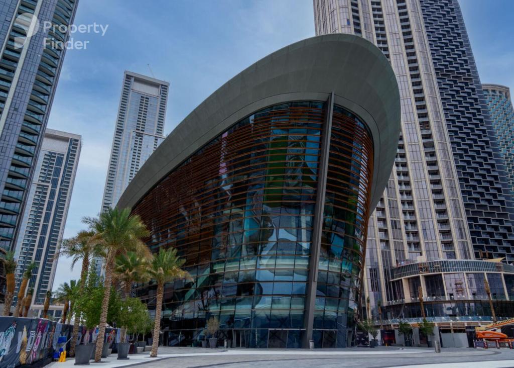 a building in a city with tall buildings at Stunning One bed Dubai mall downtown in Dubai