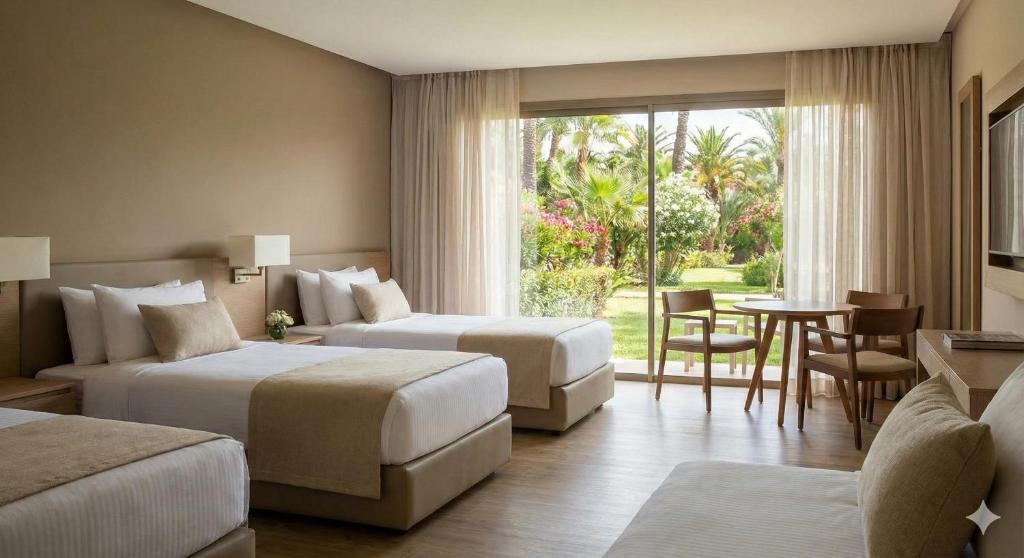 Prime Delta Sharm El Sheikh Resort客房内的一张或多张床位