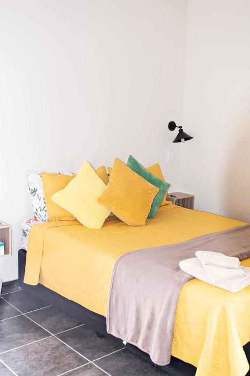 Ένα ή περισσότερα κρεβάτια σε δωμάτιο στο Pecan and Lime Inn The Second Den