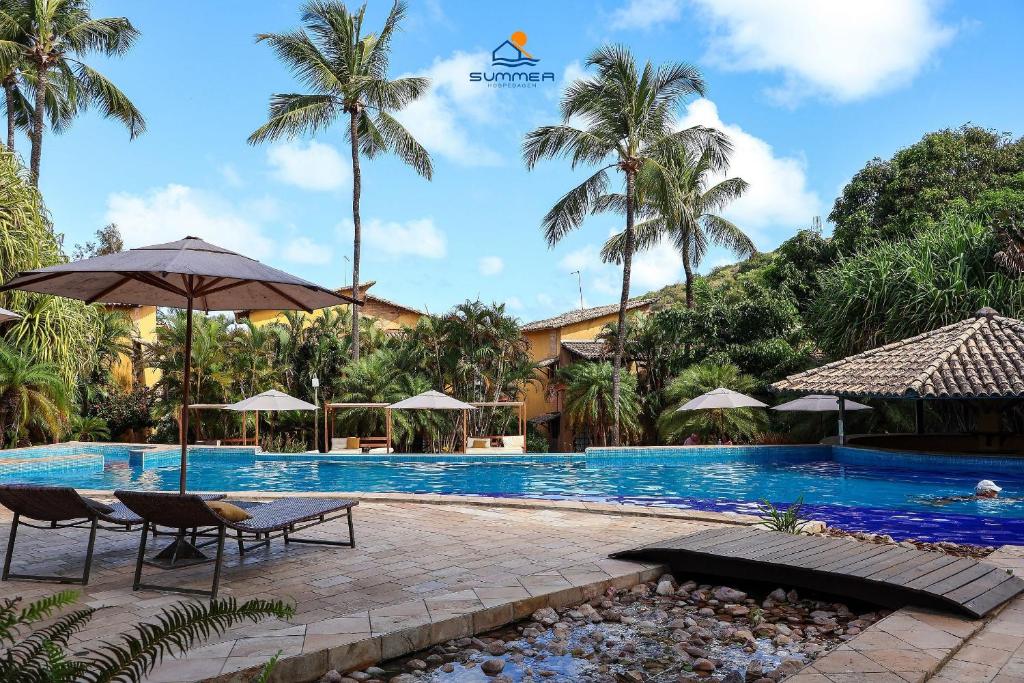 Πισίνα στο ή κοντά στο Apartamento Girassóis com 2 suites- Summer Hospedagem