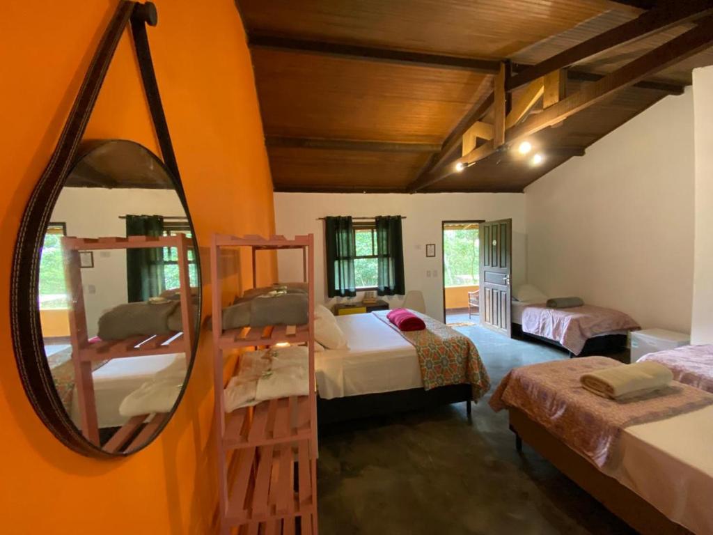 Voodi või voodid majutusasutuse Pousada Rancho da Serra PETAR toas