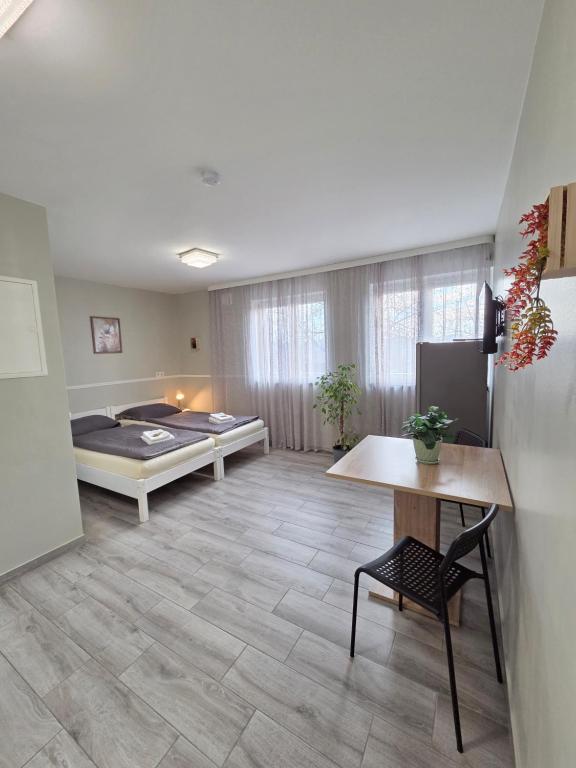 Postel nebo postele na pokoji v ubytování Modern Living Apartment Hotel