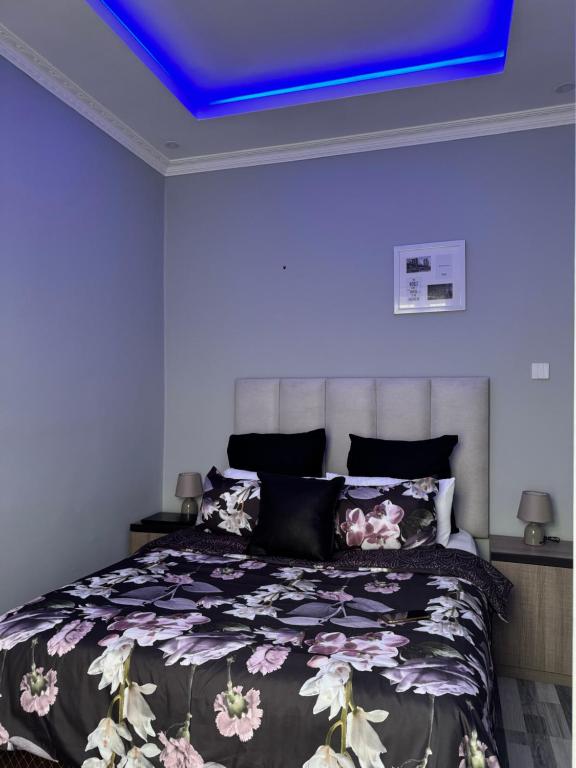 Ένα ή περισσότερα κρεβάτια σε δωμάτιο στο Chipangano Apartments