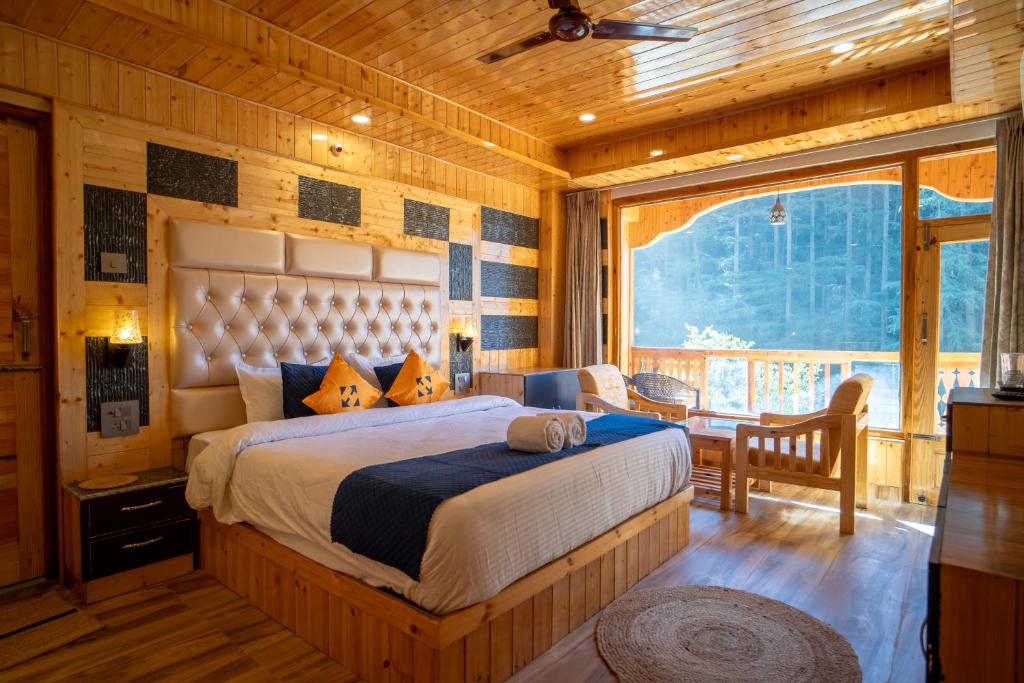 Giường trong phòng chung tại Hide-In Kasol