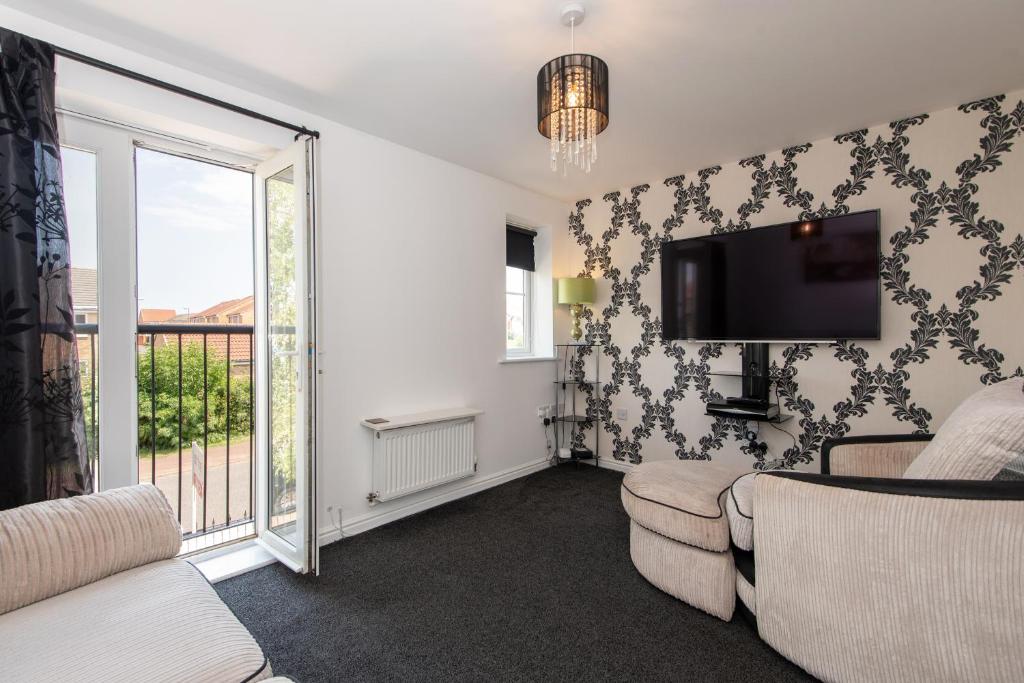 Et opholdsområde på Thinford View 4 bed, 2bath, Parking, Garage