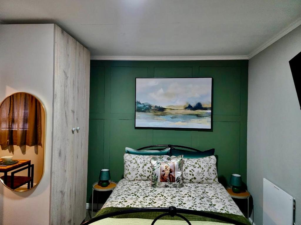 Ένα ή περισσότερα κρεβάτια σε δωμάτιο στο Walnut Studio