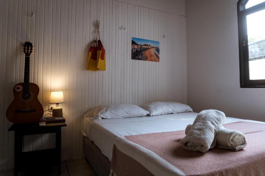 Ένα ή περισσότερα κρεβάτια σε δωμάτιο στο Surf Paradise