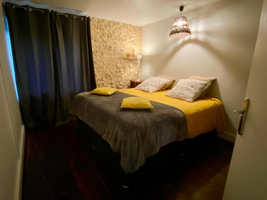 Postel nebo postele na pokoji v ubytování Domaine d'Empié