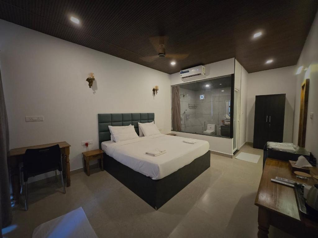 Postel nebo postele na pokoji v ubytování Orange Sky Inn