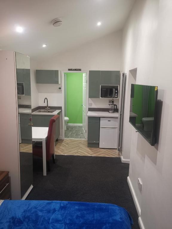 Kuchyň nebo kuchyňský kout v ubytování Millhouse Property