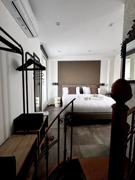 Ένα ή περισσότερα κρεβάτια σε δωμάτιο στο TERA house&rooms