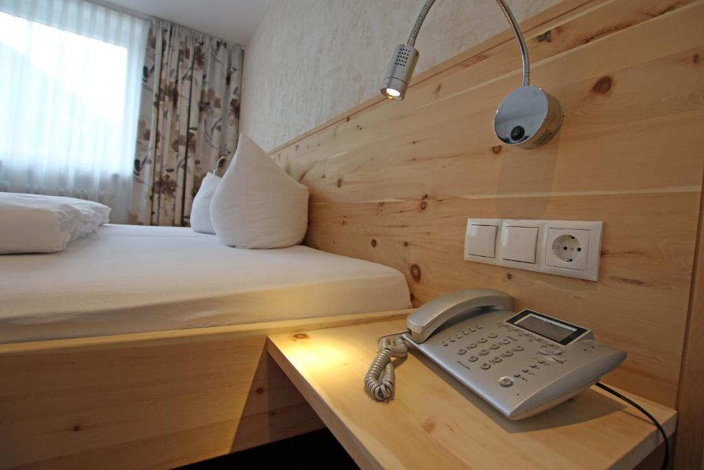 Postel nebo postele na pokoji v ubytování Pension Fuchs
