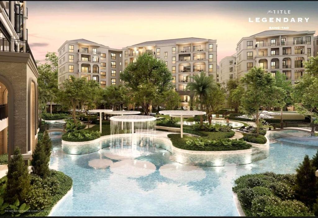 una vista aerea di un resort con una fontana di 2 bedroom Apartment Title Legendary Bangtao beach a Bang Tao Beach