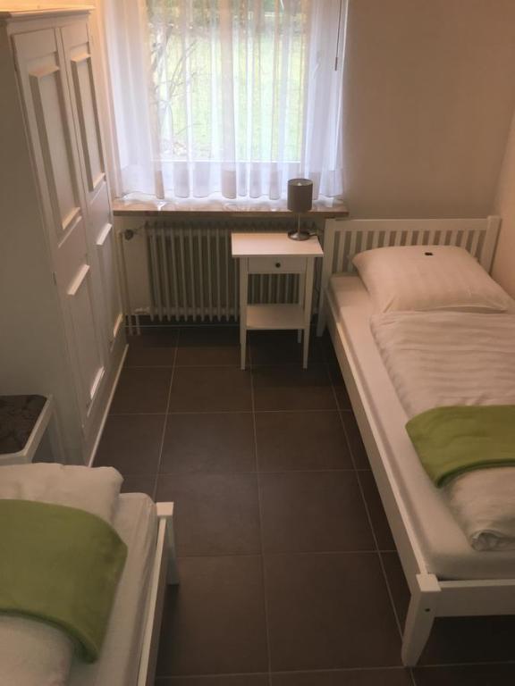 Postel nebo postele na pokoji v ubytování Gasthof Menke
