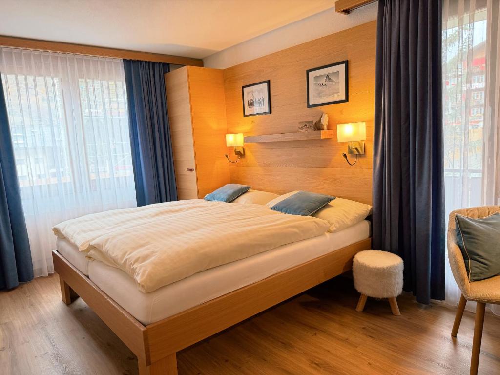 Postel nebo postele na pokoji v ubytování Chalet Achat