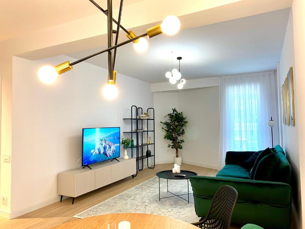 TV a/nebo společenská místnost v ubytování V25Appartments Cozy