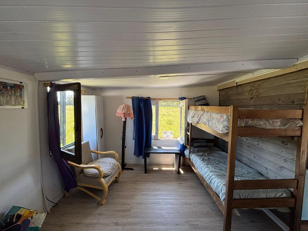 Ένα ή περισσότερα κρεβάτια σε δωμάτιο στο Eco Cabaña Mayjora Refugio natural en el campo, entre el océano Atlántico y la laguna Garzon