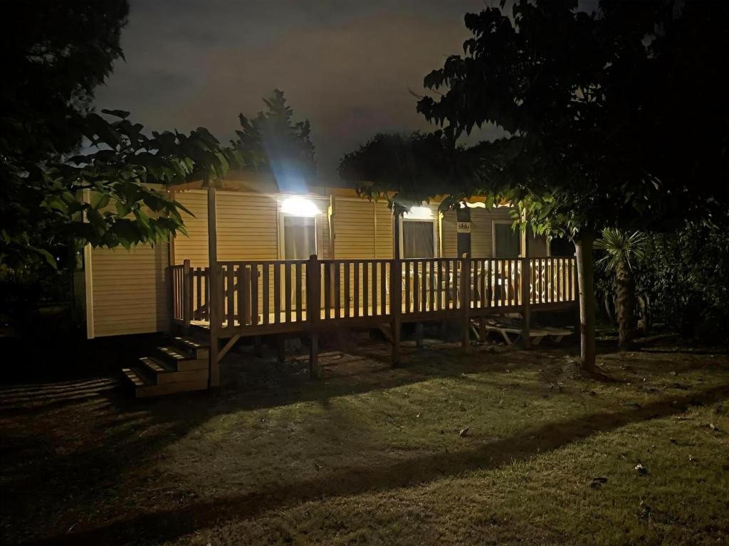a house with a light on the side of it at night at BT - Le Soleia, confort & lumière, 2 ch, 2 sdb, entre mer et Petite Camargue, super équipé in Lattes