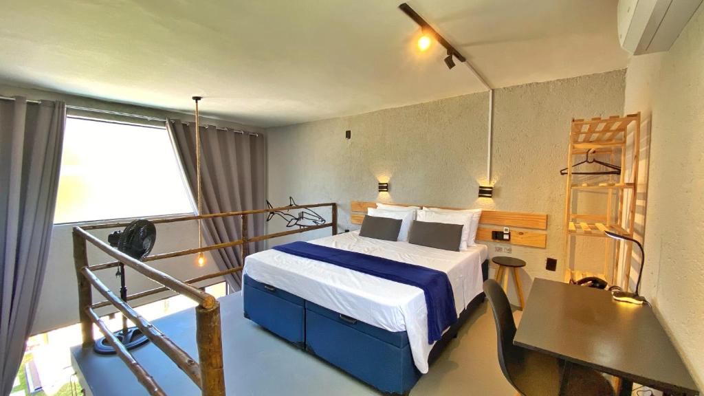 Postel nebo postele na pokoji v ubytování LOFT Mar 101 - Com Piscina Privativa a Poucos Passos de Vilas Gastronômicas Polo de Artesanato e Associação Peixe-boi