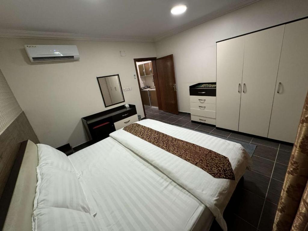 Postel nebo postele na pokoji v ubytování شقق فندقيه