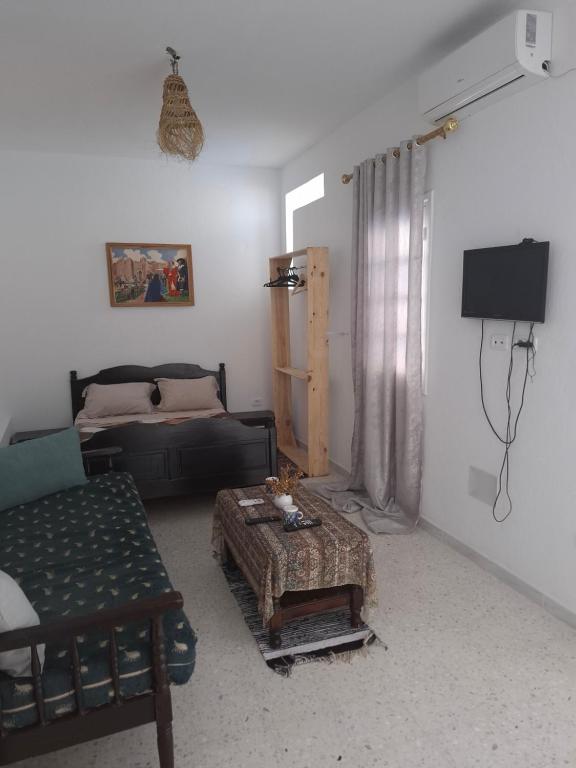 TV a/nebo společenská místnost v ubytování Casa Di Sofra