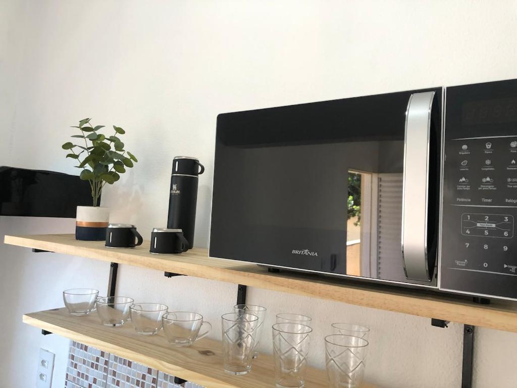 Kuchyň nebo kuchyňský kout v ubytování Kitnet em Araras