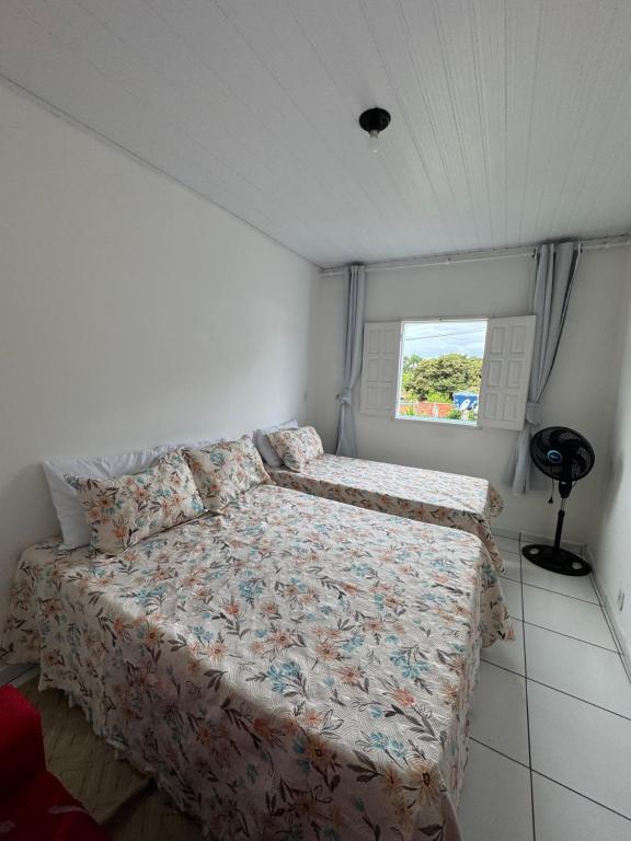 Postel nebo postele na pokoji v ubytování Casa Dona Vera - Seu Refúgio no Centro Histórico