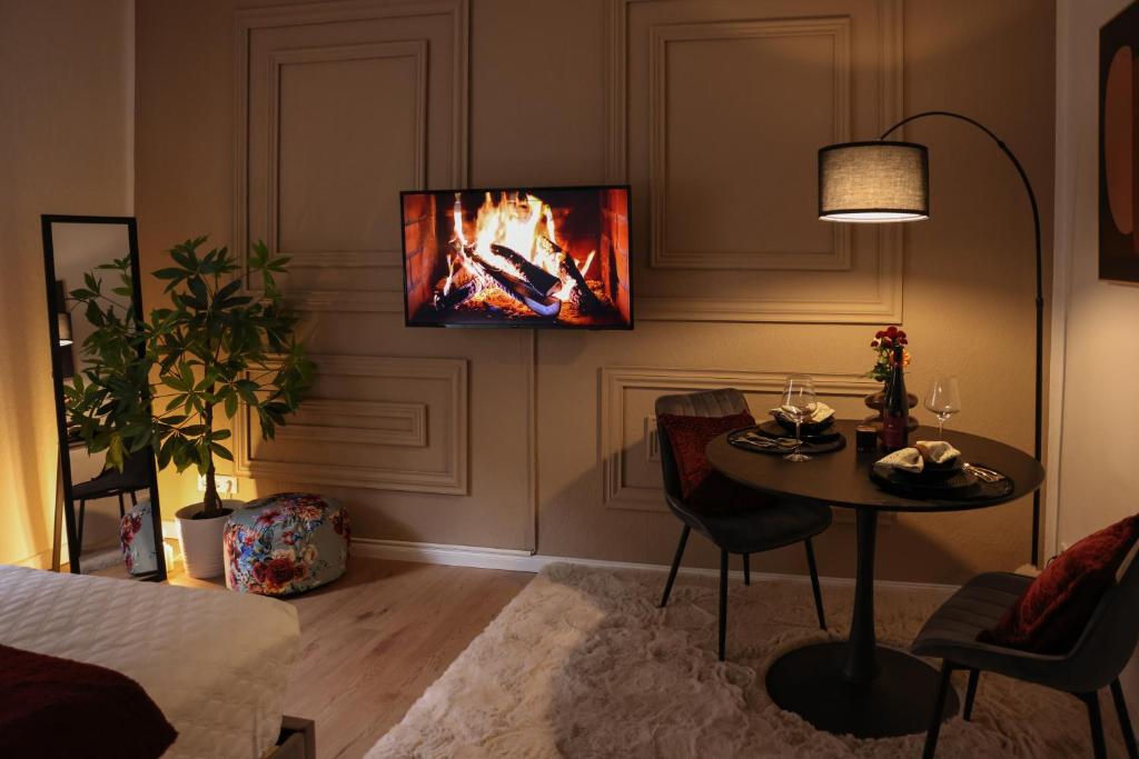 TV a/nebo společenská místnost v ubytování Arden Stay Apartments