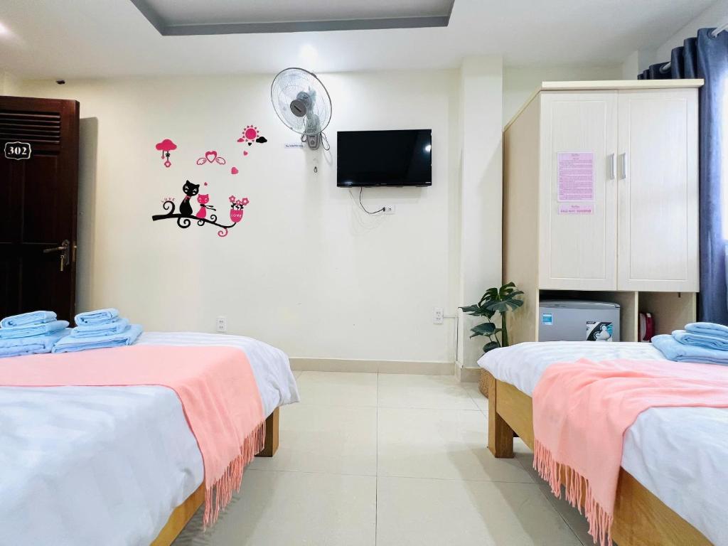 Letto o letti in una camera di Rin Bon Home