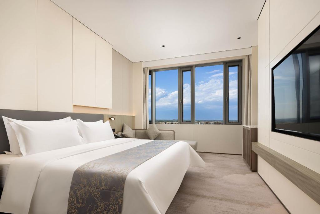 Φωτογραφία από το άλμπουμ του Daxing Airport Wanxin Hotel σε Langfang