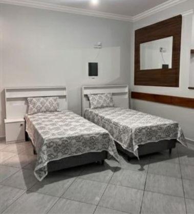 Кровать или кровати в номере 4 Marias Hospedagem