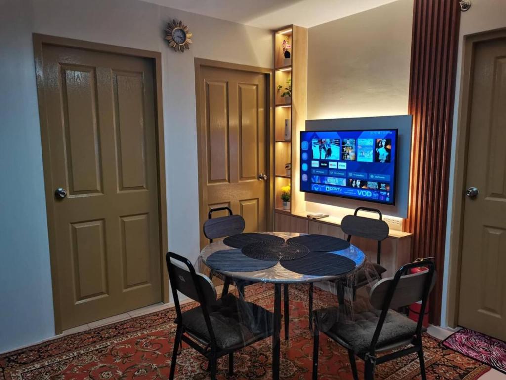 TV a/nebo společenská místnost v ubytování KozySpace