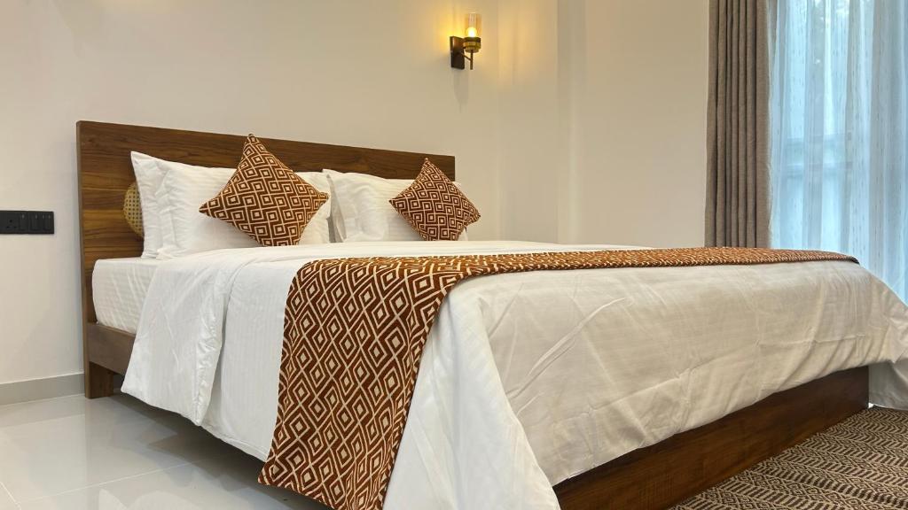 Voodi või voodid majutusasutuse The Palazzo - Weligama toas