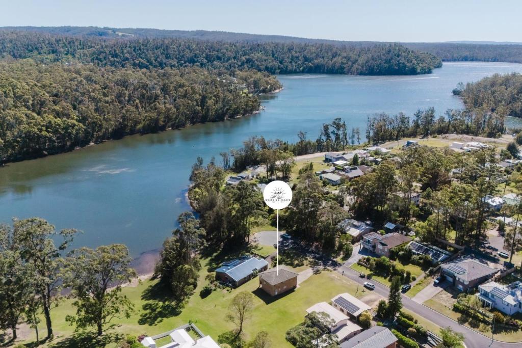 an aerial view of a subdivision with a lake at Paradise Lake in Yatte Yattah