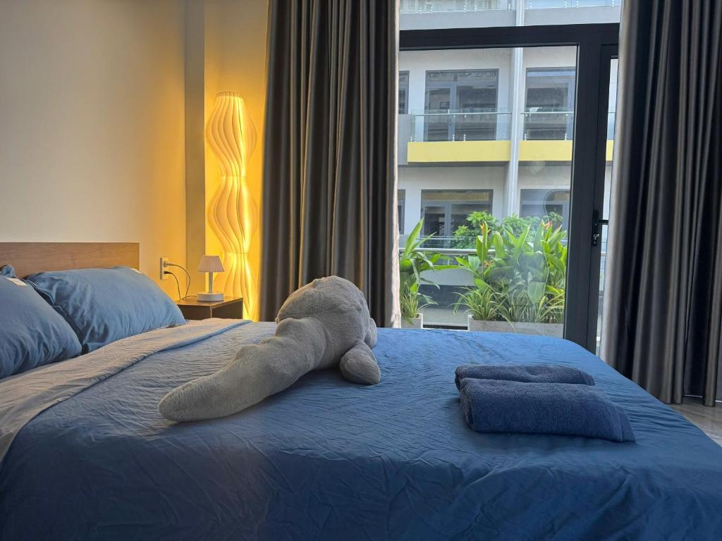 Giường trong phòng chung tại Rainbow Homestay