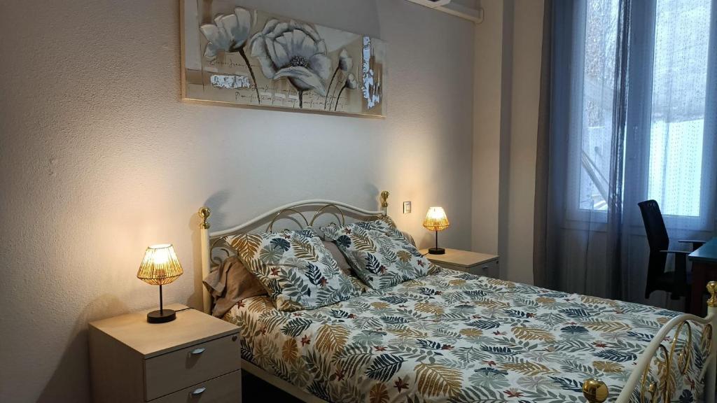 Ένα ή περισσότερα κρεβάτια σε δωμάτιο στο Hôtel Perpignan Centre