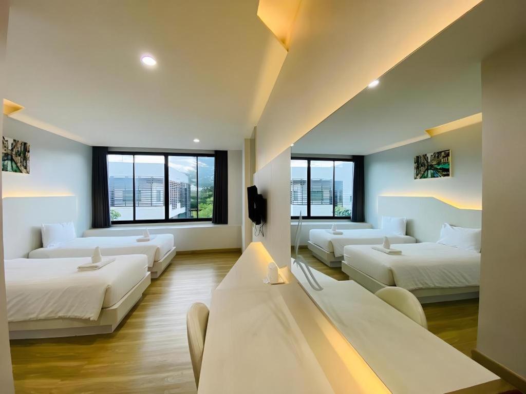 Postel nebo postele na pokoji v ubytování Luxsna Residence