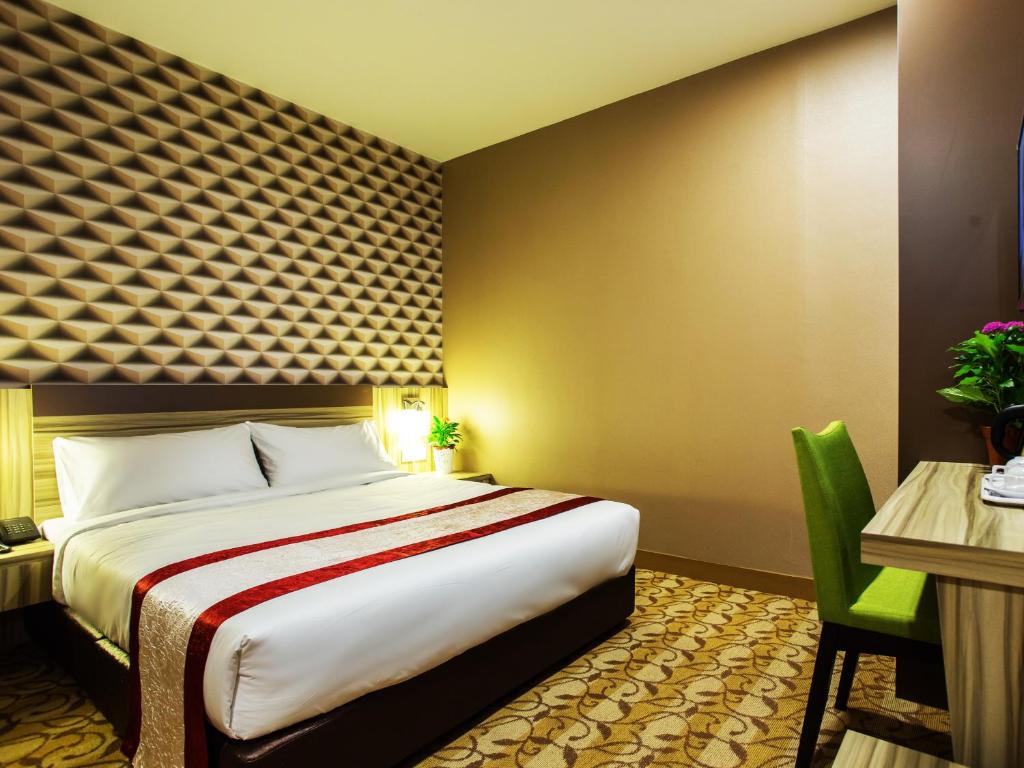 Postel nebo postele na pokoji v ubytování LS Hotel