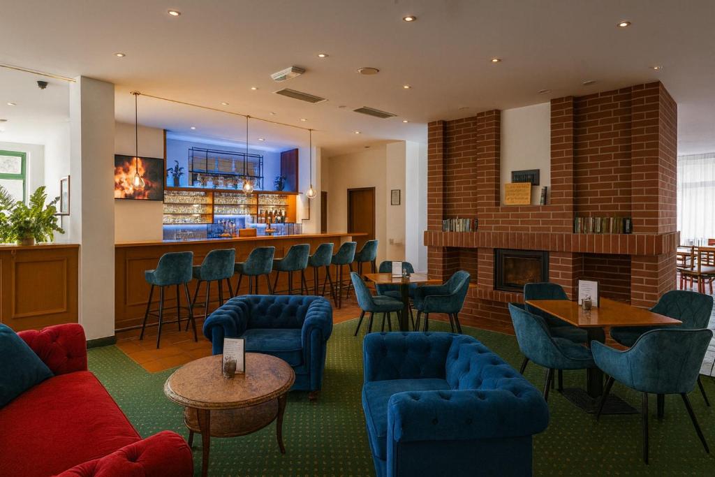 Χώρος καθιστικού στο Acron-Hotel Quedlinburg