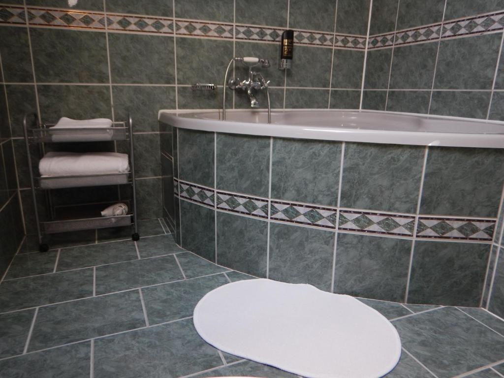 Koupelna v ubytování Hotel Barbakan