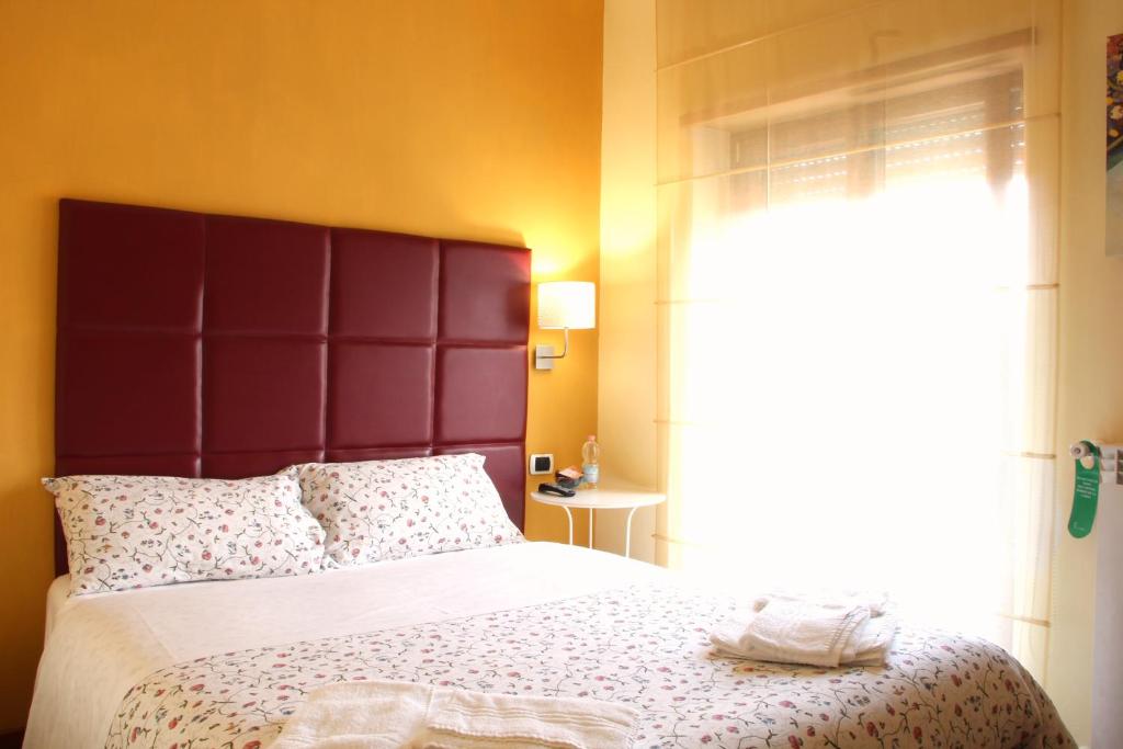 Postel nebo postele na pokoji v ubytování B&B da Peppe