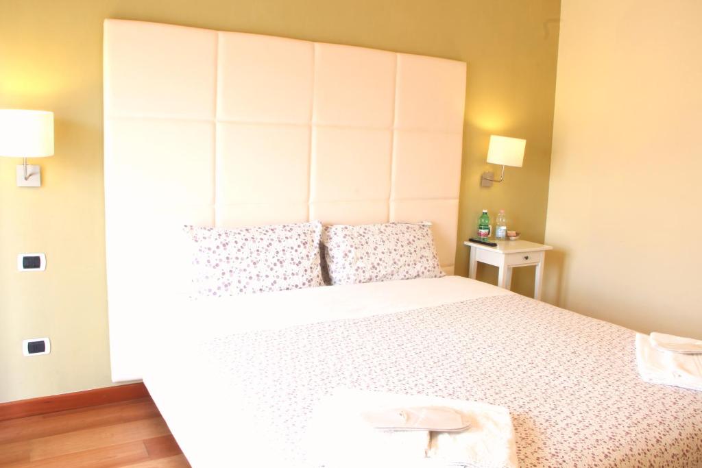 Postel nebo postele na pokoji v ubytování B&B da Peppe