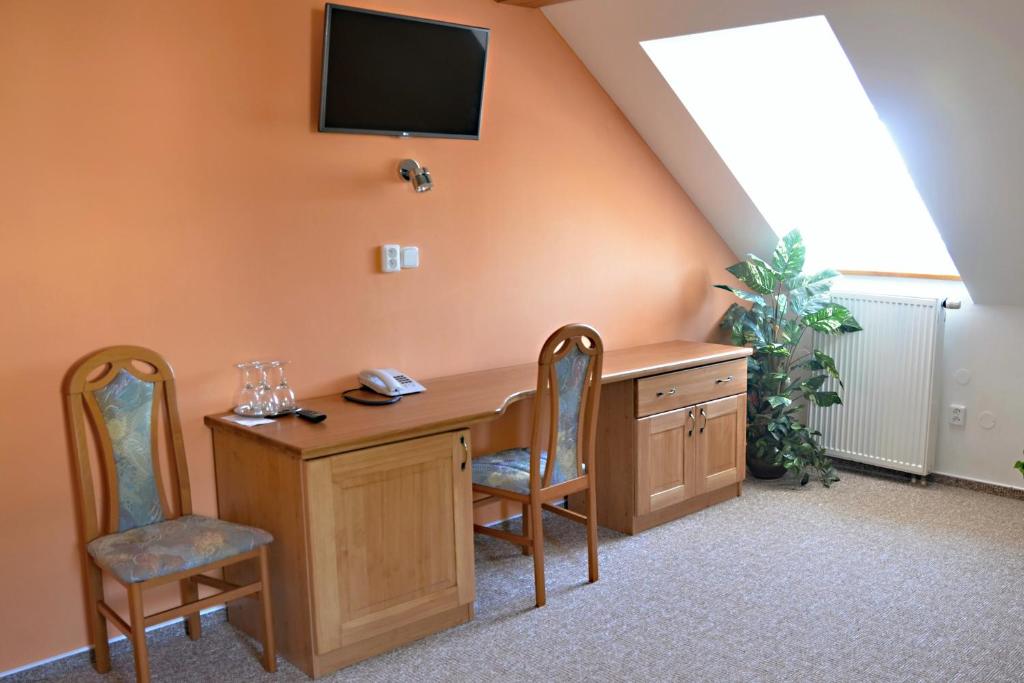TV a/nebo společenská místnost v ubytování Hotel Na Statku